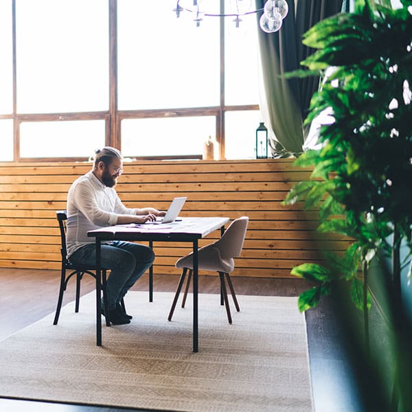 Man at computer wondering what is a website title