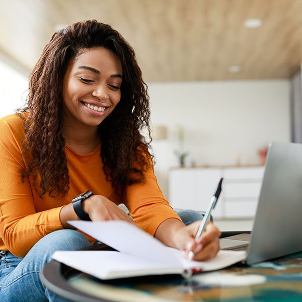 Woman at laptop learning about PPC consulting