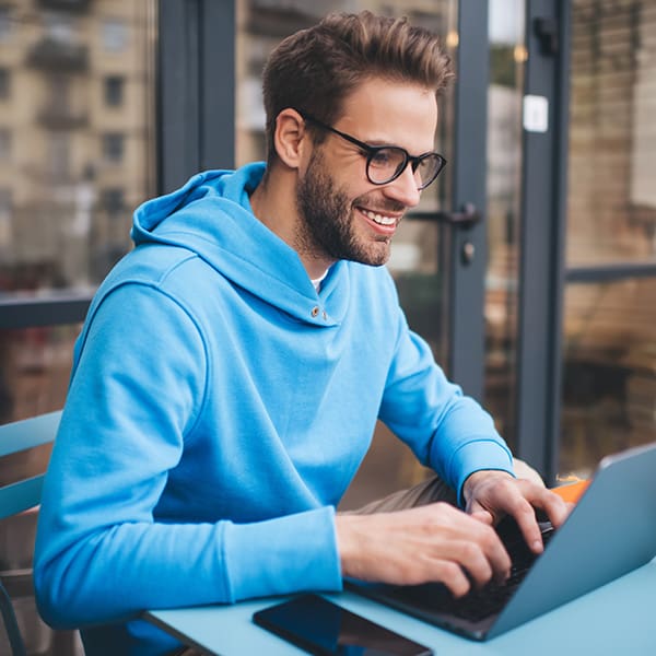 Man on his laptop learning about email marketing best practices